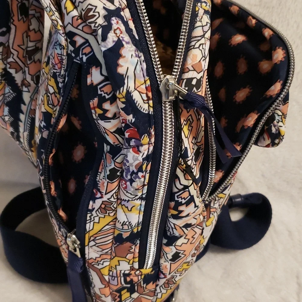 Vera Bradley Women's‎ Performance Twill Utility sling backpack.
